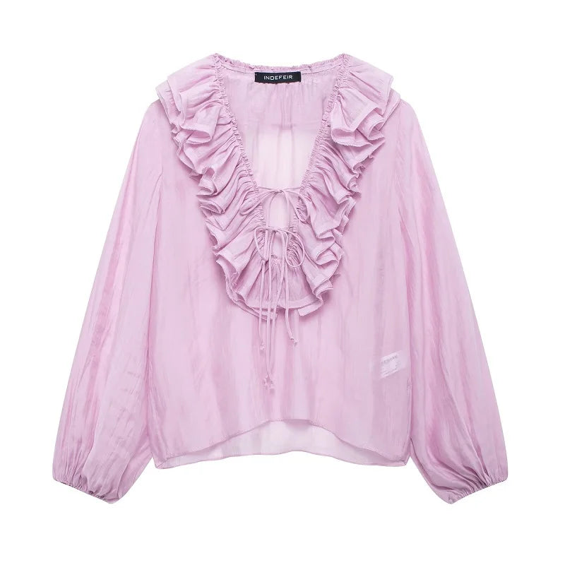 Rüschenbluse mit halbtransparentem Look